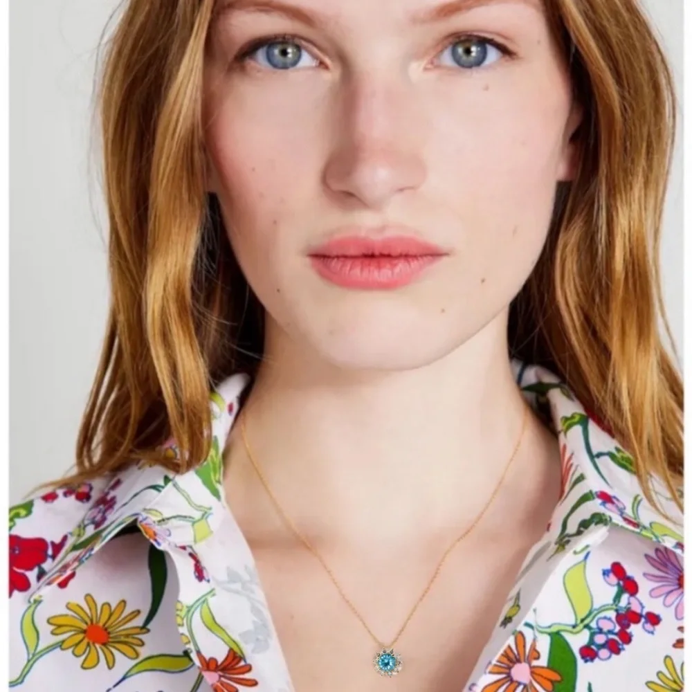 KATE SPADE • Gold Sunny Blue Topaz Halo Necklace